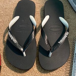 Men’s flip flops black and white, worn once
